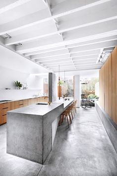 an instagramted photo of a kitchen and dining room