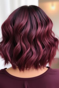 A fresh twist on the burgundy balayage short hair with deep maroon waves creates a striking effect. The rich burgundy layers make a statement, especially when paired with soft curls created using a curling iron. Click here to check out more stunning burgundy balayage hair ideas trending right now. Burgandy Hair Short Hair, Long Bob Hairstyles Burgundy, Shoulder Length Hair Red Auburn, Short Burgundy Hair With Highlights, Spring Color Hair Ideas, Short Hair Inspiration Color, Burgundy Bob Hair, Pink Highlights In Brown Hair Curls, Short Burgundy Hair Bob