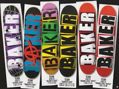 five skateboards are lined up in a row on the same board as each other