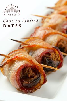 bacon wrapped dates on a white plate with the words chorizo stuffed dates above them