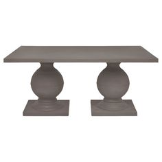 an image of a table with two vases on the top and one is grey