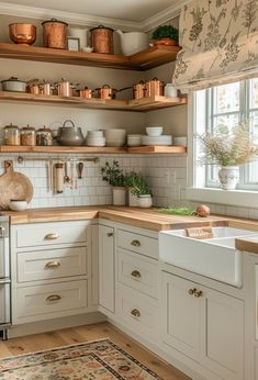 Discover expert tips for designing a charming cottage-core kitchen. Embrace rustic elegance with natural materials, vintage finds, and whimsical touches. #farmhouse #kitchen Kitchen Cozy Modern, Gray Cottage Kitchen, Timeless Cottage Kitchen, Traditional Vintage Kitchen, Kitchen Rustic Ideas, Cream Cottage Kitchen, Vintage Cozy Kitchen, Cottage Inspired Kitchen, Grannycore Kitchen