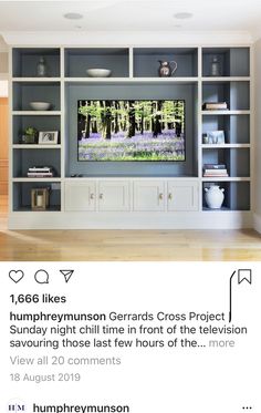 the instagram page on instagram com shows an image of a living room with built - in bookshelves