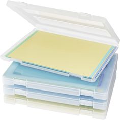 three plastic storage boxes stacked on top of each other with yellow and blue dividers