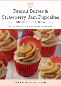 some cupcakes with peanut butter and strawberry jam on top