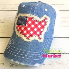 a denim cap with an american flag patch on it and the state of north carolina