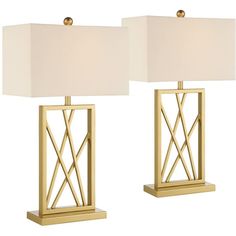 two lamps with white shades on them