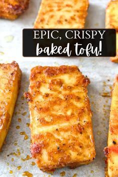 crispy baked tofu on a baking sheet with the words epic crispy baked tofu