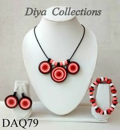 a necklace and earring set made out of polymer beads