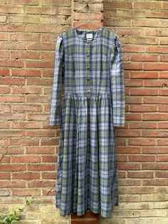 Vintage tartan flannel dress by Laura Ashley Plaid Cotton Dresses For Daywear, Plaid Cotton Dress For Winter, Vintage Plaid Dress For Winter, Vintage Plaid Dress For Fall, Vintage Plaid Winter Dress, Plaid Long Sleeve Dress For Daywear, Fitted Plaid Dress With Buttons, Long Sleeve Plaid Dress For Fall Daywear, Long Sleeve Gingham Plaid Dress For Daywear