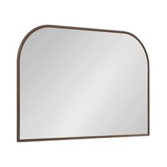 an arched mirror is shown against a white background and has brown trim on the edges