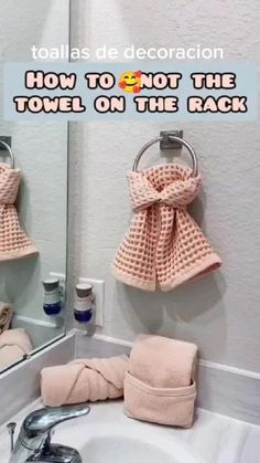 a bathroom sink with towels hanging on the wall and a mirror above it that says, how to not the towel on the rack