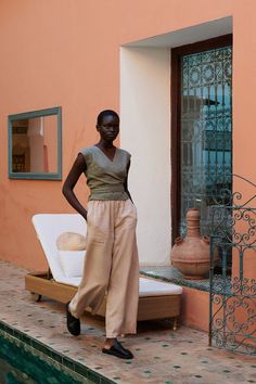 Summer Linen Bottoms In Neutral Color, Relaxed Fit Linen Pants In Khaki, Khaki Linen Pants Relaxed Fit, Khaki Relaxed Fit Linen Pants, Relaxed Fit Khaki Linen Pants, Spring Khaki Linen Pants, Khaki Wide-leg Linen Pants, Khaki Linen Ankle-length Pants, Chic Linen Culottes For Spring