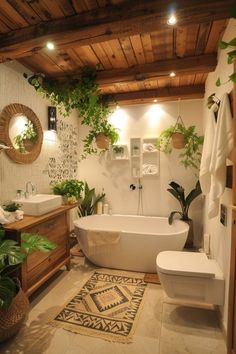 a bathroom with a tub, toilet and plants on the wall next to the sink