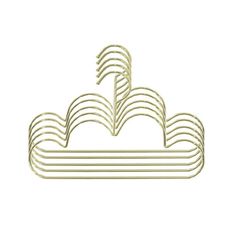 a gold metal object with wavy lines in the shape of waves on a white background