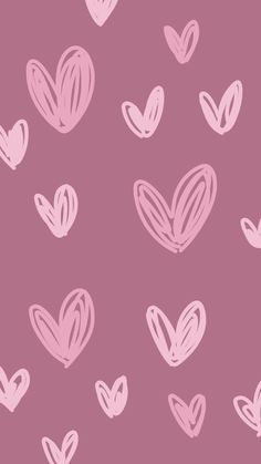 hearts drawn in pink on a purple background