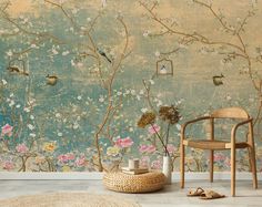 a room with flowers and birds on the wall