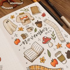 an open notebook with the words november surrounded by doodles and other things on it