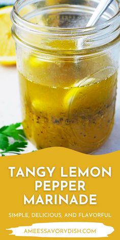 a mason jar filled with tangy lemon pepper marinade