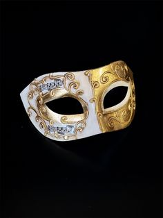 This exquisite mask exudes sophistication and charm. The intricate musical notes add a touch of melody to your ensemble, making it perfect for masquerade balls, galas, and unforgettable nights.


Age Group/Gender - Adult/Men's

Size/Type - One size fits all adults

Mask Color - Gold

Mask Material - Polyresin

Accent Material - Paint

Special Features - Music Notes Gold Masks For Carnival And Formal Events, Gold Masks For Formal Carnival Occasions, Gold Formal Masks For Carnival, Gold Venetian Masquerade Mask For Formal Occasions, Elegant Formal Masks For Carnival, Elegant Formal Mask For Carnival, White Formal Masquerade Mask For Carnival, Venetian Formal Eye Mask, Elegant Adjustable Masquerade Mask For Mardi Gras