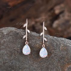 Product Detail Material: 925 Sterling Silver, 10k/14k/18k Solid Rose/White/Yellow Gold, Platinum Quantity: 2pcs (a pair) earrings Center Stone: 6x8mm Pear Cut Lab Opal Side Stones: 1.5x3mm Marquise Cut Moissanites Custom Service 1, Gemstones can be replaced with others. 2, All metal can be customized. 3, The earrings can be customized according to the design you want. Please contact us if you need any personalized custom earrings. We will try our best to meet your needs. Only you can't think of it, we can't do it without us. Shipping It's made-to-order jewelry, it will take 2-4 weeks to make it. Once the pendant/necklace is finished, it will be sent by USPS, FedEx or DHL. Return & Refund There is a 30-day return guarantee. But as it's handmade pendant/necklace, handcrafted fee and shipping Pear-shaped Opal Jewelry For Formal Occasions, Elegant Pear-shaped Opal Jewelry, Opal Teardrop Earrings, Teardrop Opal Earrings In Gold, Opal Gemstone Drop Earrings, Opal Drop Earrings, Handmade Pendant Necklace, Moissanite Earrings, Earrings Unique