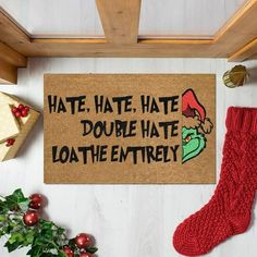 a door mat that says hate, hate, hate, doube hate loot the entirely