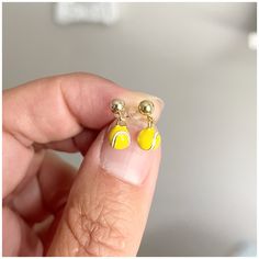 ★ ITEM DESCRIPTION: * 14k gold filled post 4mm ball ear hooks * Enamel mini tiny tennis balls The earrings measure 0.5 inches (12mm) from top to bottom. Necklace available here: https://www.etsy.com/listing/655758357 Gold filled is different than gold plated. The value of gold-filled is greater than gold-plated because gold-filled has an actual layer of karat gold, not just a microscopic film. It is an actual layer of 14k yellow gold or 20k rose gold that is pressure bonded to a base metal. Beca Ball Earrings Gold, Tennis Earrings, Jewelry Cute, Ball Earrings, Tennis Balls, Tennis Player, Tennis Ball, Team Gifts, Pure Gold