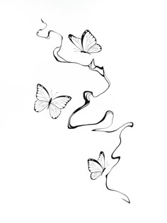 three butterflies flying in the air on a white background