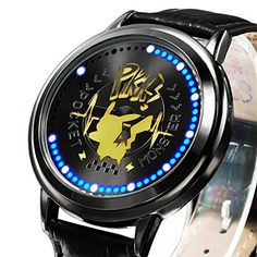 a black watch with yellow and blue lights on it's face, in front of a white background