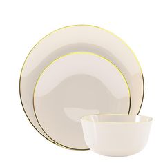 a white and gold dinner set on a white background