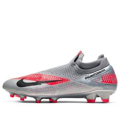 the nike vapor soccer shoe is shown in grey and red tones, with black accents