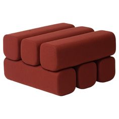 three red couches sitting on top of each other in front of a white background