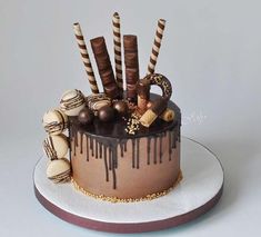 a cake with chocolate icing and candies on top