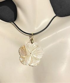 "White  Mother of Pearl Flower Pendant Necklace , Abalone Necklace, White Shell Pendant Necklace  Pendant is 2 \" Long with the connector bale x 1 1/4\" wide. 18\" cord + 2\" extension Please know that due to the shell , they are not exactly the same. There may be a little more of tan on parts of the shell or a little less. Please check through my other listings ! If you have any questions, feel free to ask as I do not accept returns ! Thank You for stopping by" White Pendant Necklace, Shell Pendant Necklace, Flower Pendant Necklace With Adjustable Cord, Shell Necklace Aesthetic, Big Pendant Necklace, Dope Jewelry Accessories, Abalone Necklace, Clay Pendants, Mother Of Pearl Necklace