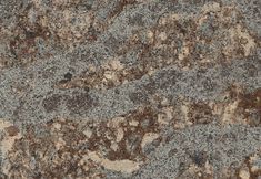 a granite counter top with brown and tan colors