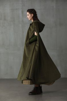 Maxi Hooded Wool Coat Cloak (8 Colors) – Linennaive Winter Outdoor Cape, Hooded Green Cape For Fall, Green Hooded Cape For Fall, Fall Cotton Cape Outerwear, Green Winter Cape Outerwear, Oversized Solid Color Cape Outerwear, Green Long Sleeve Winter Cape, Green Cape Outerwear For Fall, Oversized Green Cape Outerwear