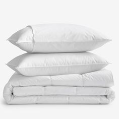 three pillows stacked on top of each other