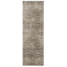 a large rug with an ornate design on the bottom, and a long border in grey tones