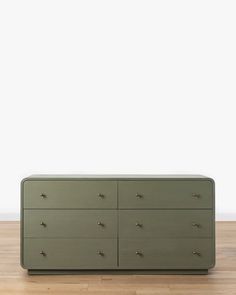 With soft, rounded edges, our Wilkins Laurel Dresser is sleek and elevated, with a laurel green finish. Crafted from acacia and featuring soft-close drawers finished with brass-plated hardware, the laurel green dresser brings both form and function to your bedroom design. Round Dresser, Green Nightstands, Mcgee And Co, Lowboy Dresser, Low Dresser, Green Dresser, Wide Dresser, Unique Furniture Pieces