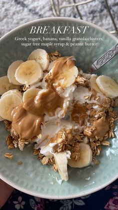 a bowl filled with granola, bananas and yogurt on top of it