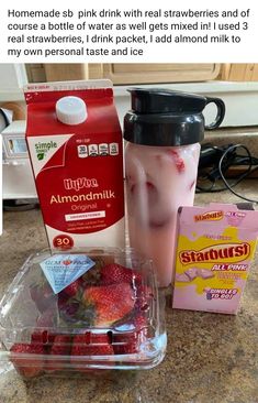 the ingredients to make strawberry milkshake are displayed