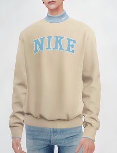 a man wearing a sweater with the word nike on it, standing in front of a white background