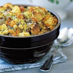 a pan filled with food sitting on top of a table