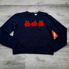 * New, With Tags * 100% Cotton * Navy Blue With Apples Across Front * 2 Small Buttons On Back * Same Or Next Day Shipping Apple Sweater, On Back, Colorful Sweaters, Kids Shirts, Apples, Sweater Top, Shirts Tops, Kids Shop, Color Blue