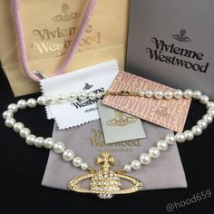 "Brand New With Box,Dust Pouch And Cloth 1 Row Faux Pearl Bas Relief Necklace Approx Longth 20” Saturn It Is Large, Approx 2.5” Long X 1.5” H Metal Brass Alloy Accept Reasonable Offer" Vivienne Westwood Pearl Necklace, Vivienne Westwood Bracelet, Vivienne Westwood Jewelry, Vivienne Westwood Earrings, Rose Gold Choker, Vivienne Westwood Jewellery, Saturn Necklace, Chunky Pearls, Pearl Drop Necklace