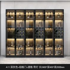 an image of a store display case with many bottles and glasses in it's glass doors