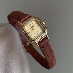 Color: brown Women’s Leather Watch, Vintage Watch Aesthetic, Chic Watches, Thrift List, Vintage Color Schemes, Dainty Watch, Brown Leather Watch, Watches Women Leather, Rings And Necklaces