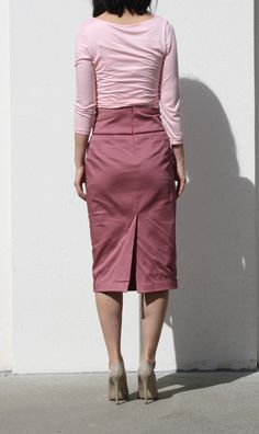 "High waist skirt in classic pencil skirt length This skirt is constructed with meticulously to fit each size It is made of high quality dusty pink cotton fabric with hint of stretch Knee length skirt is detailed with color contrast piping around waist Wardrobe staple piece all year round -Tailored Fit -Drops below knees ( if you need it shorter or longer simply ask ) -Constructed with high waist ( 4\" wide waist band sits about 2\" above naval ) -Piping detail around waist and pockets ( color c High Waist Stretch Gathered Skirt, Solid Wrap Skirt For Work, Solid Color Wrap Skirt For Work, Fitted Midi-length Bottoms For Office, Fitted Knee-length Bottoms With Pockets, High-waisted Gathered Skirt For Work, High Waist Pink Skirt For Work, Pink High Waist Skirt For Workwear, Elegant Cotton Pencil Skirt Bottoms