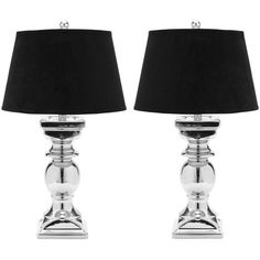 a pair of lamps with black shades on them