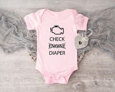 "Dad Diaper Change Shirt, Check Engine Diaper Shirt, Cute Mechanic Baby Clothes, Funny Mechanic Pregnancy Announcement, Funny Baby Shirts   🎈HOW TO ORDER 1-) Please, check and review all the photos. 2-) Choose your t-shirt size and color. *Different styles of shirts may have different shades of same color choice due to different manufacturer brands. *For this reason, we recommend you to match shirts from the same styles if you want precisely matching colors (ex. Unisex, V-necks, Toddler, etc.). 3-) Click add to cart. You can go back to add more shirts. 4-)Click \"Proceed to check out\". 5-)When you check out, you can add a note to seller for any request. 🎈PRODUCT DESCRIPTION UNISEX SHIRTS * Unisex t shirt fits like a well-loved favorite, featuring a crew neck, short sleeves and designed Mechanic Baby Announcement, Baby Mechanic, Pregnancy Announcement Funny, Baby Clothes Funny, Diaper Shirt, Funny Baby Shirts, Funny Mechanic, Goth Baby, Fall Baby Clothes